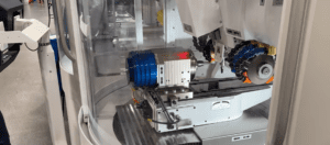 WALTER Helitronic Mini Plus performing 5 axis CNC grinding with FANUC LR Mate robotic loader for automated, high-volume tool production.